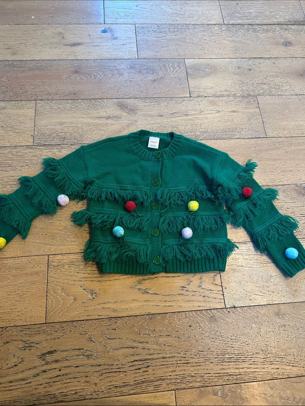 Holiday Time Green Fringe Cardigan with Multicolor Pom Poms